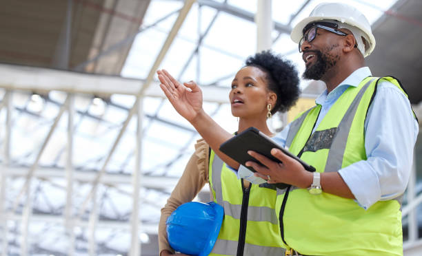Construction team reviewing plans